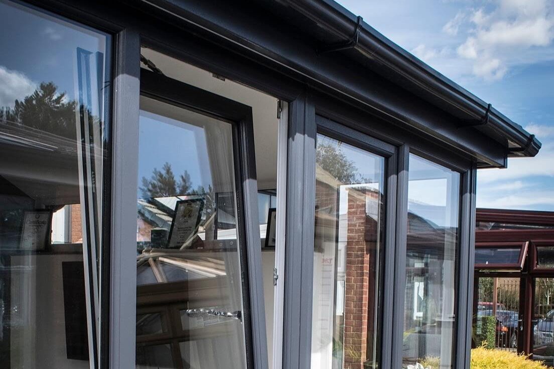grey upvc tilt and turn windows
